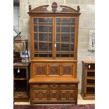 A large Victorian oak secretaire bookcase, width 144cm, depth 61cm, height 290cm, believed to