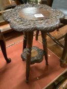 An early 20th century Indian carved hardwood occasional table, width 32cm height 54cm
