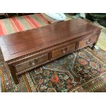 A Chinese hardwood rectangular three drawer coffee table, width 136cm, depth 51cm, height 40cm