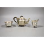 An Edwardian & later matched silver three piece bachelor's tea set,gross 12oz.