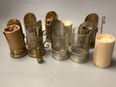 A collection of candle carriers