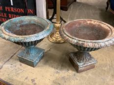 A pair of Victorian cast iron campana garden urns, 54cm diameter, height 48cm