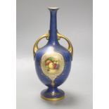 A Royal Worcester fruit painted two handled blue ground vase, 23cm high (neck broken and badly re-