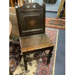 A 17th century oak back stool with bobbin front stretcher, width 47cm, depth 38cm, height 96cm