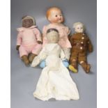 A collection of four dolls including an AM bisque head doll, height 38cm