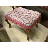 A Victorian mahogany dressing stool with needlework top, on cabriole legs, width 66cm