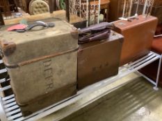 Three vintage suitcases and trunks