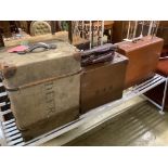 Three vintage suitcases and trunks