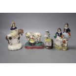 A North Country pearlware milkmaid group, c.1820, two Staffordshire figure groups and a Continental