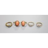 Five assorted modern 9ct gold and gem set rings, including aquamarine and two cabochon coral,gross