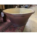 A Victorian glazed earthenware cream bowl, 52cm diameter