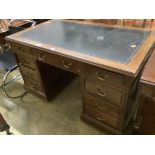 An Edwardian mahogany pedestal desk, length138cm, depth 80cm, height 81cm