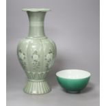 A Chinese green glazed bowl and a Korean celadon vase, height 27cm