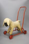 A pull along dog, height 5cm