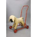 A pull along dog, height 5cm