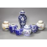 Two pairs of Chinese jars, one pair with covers, two other jars and a blue and white vase and