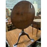 A George III oak tilt top birdcage tea table, diameter 75cm, height 75cm