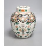 A 19th century Chinese famille verte jar and cover, 22cm high including cover