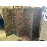 A Spanish leather folding six panel draught screen, with embossed floral printed card panels,