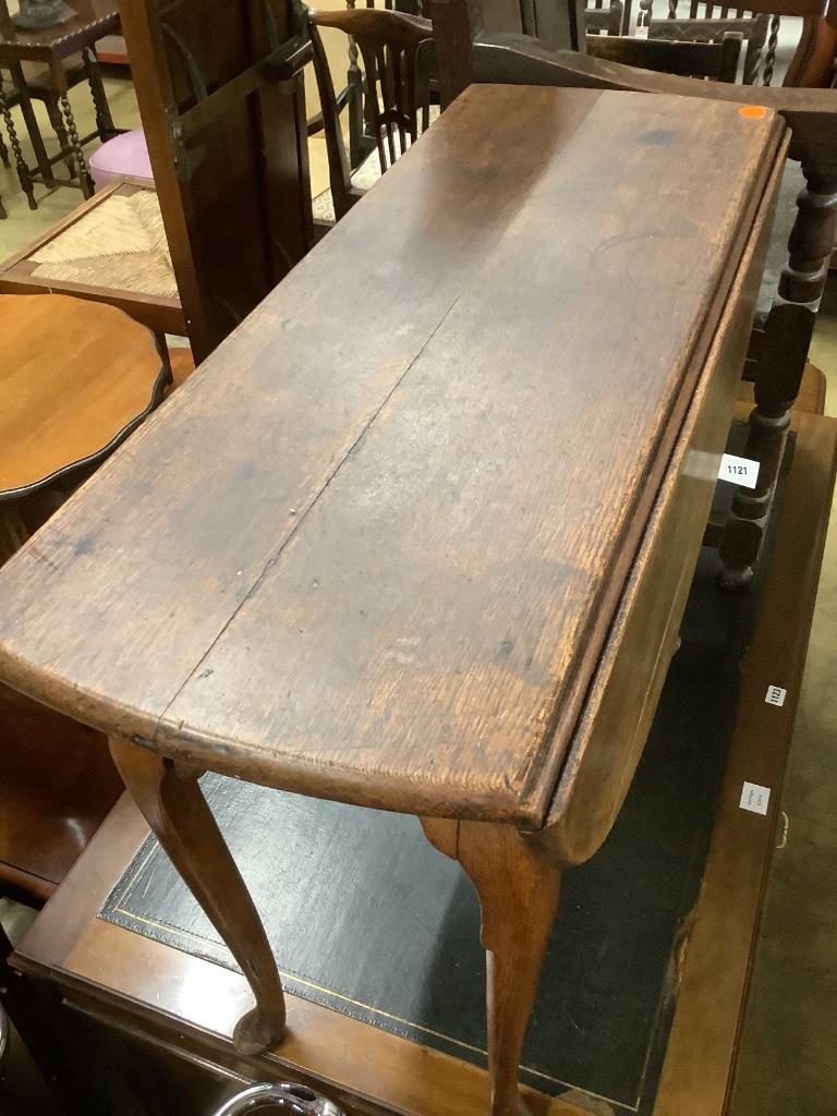 An early 18th century oak oval topped gateleg pad foot dining table, length 104cm extended, width - Image 2 of 3