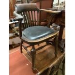 An early 20th century oak desk chair, width 66cm