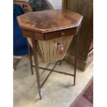 A George III banded mahogany octagonal topped work table, width 46cm, depth 40cm, height 74cm