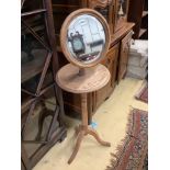 An Edwardian oak shaving stand, with telescopic plate, height approx. 133cm