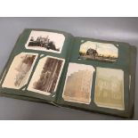 An Edwardian postcard album, British topographical to include Brighton West and Palace piers