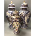 A pair of modern Chinese style lidded vases and a modern Cantonese style lidded vase, tallest 52cm