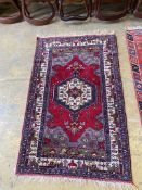 A Caucasian design rug, 160 x 104cm