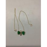 A modern 9ct gold malachite and diamond set butterfly pendant necklace, pendant width 29mm, gross