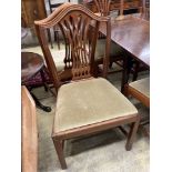 A set of eight Hepplewhite style mahogany pierced slat back dining chairs