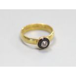 A modern 19th century style 18ct gold, black onyx and diamond set target ring,size O, gross weight