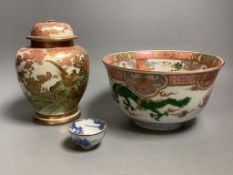 A Japanese Imari bowl and a Satsuma jar and cover and a blue and white bowl