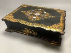An early 19th century mother of pearl inlaid papier mache stationery box, length 32cm