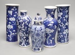 Four Chinese prunus pattern vases and a vase and cover, tallest 26.5cm