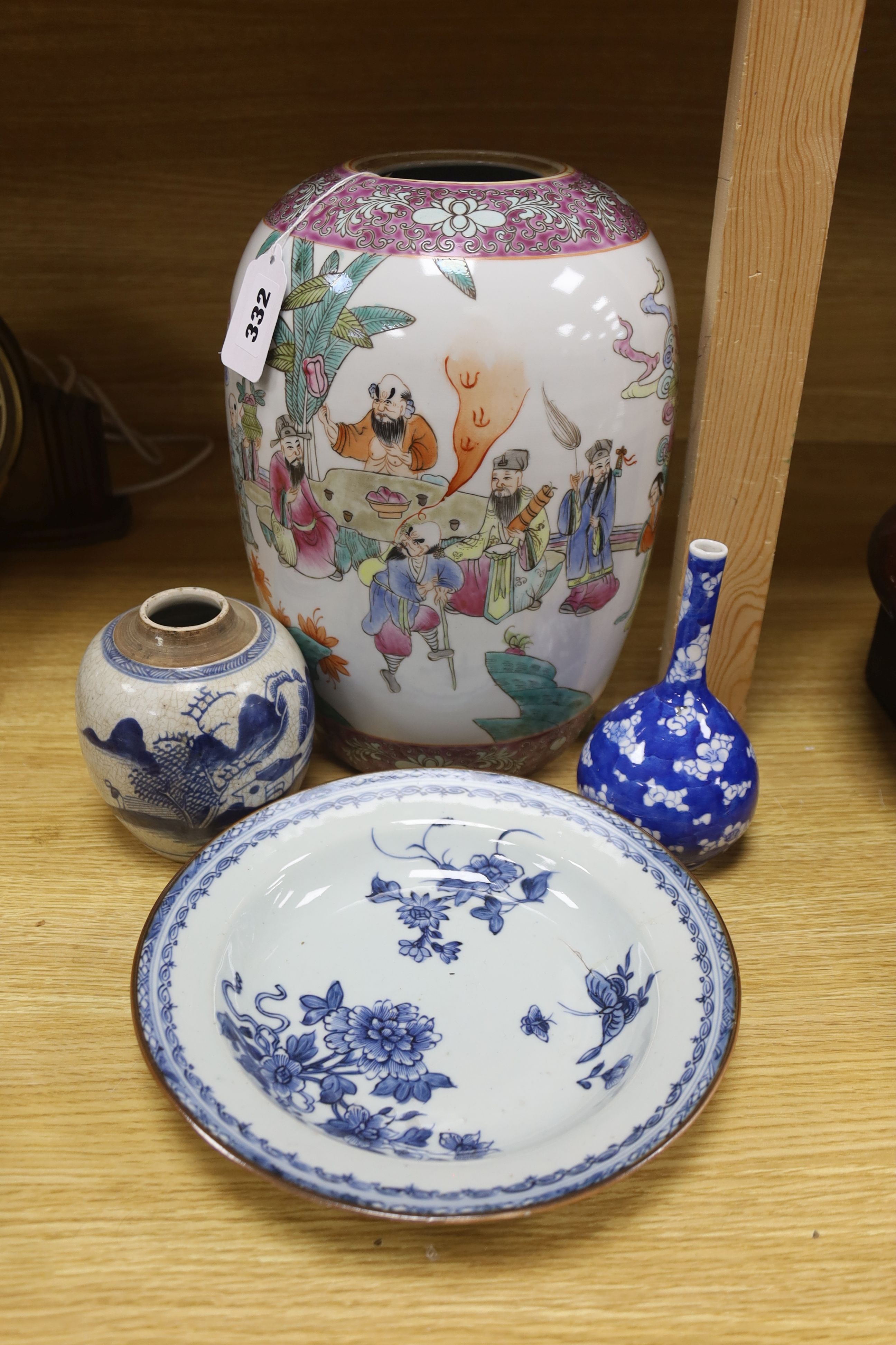 A Chinese blue and white dish, a bottle vase and jar, together with a famille rose jar lacking