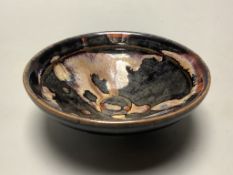 A Chinese blackware splashed bowl, 12cm