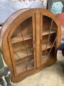 An Art Deco walnut display cabinet, width 120cm depth 33cm height 128cm