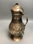A Persian engraved white metal baluster flagon,height 32.3cm, gross 31oz.