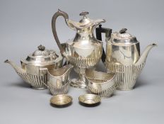 A George V demi fluted silver four piece tea and coffee service, Mappin & Webb, Sheffield, 1912, a