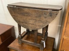 An early oak gateleg occasional table, width 60cm, depth 29cm, height 53cm