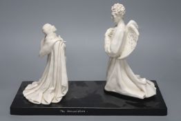 B.Henry 1956. A ceramic group 'The Annunciation', on stand, length 40cm