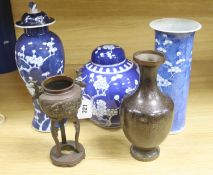 A Chinese blue and white cylindrical vase, another vase and cover and a blue and white jar and