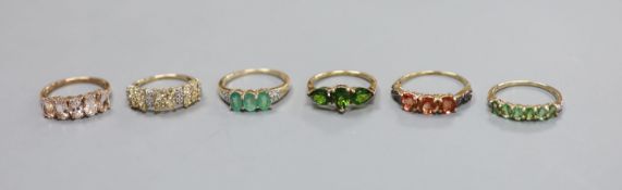Five assorted modern 9ct gold and gem set dress rings and a similar 9k ring,gross 13.1 grams.