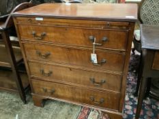 A George III style mahogany chest of four drawers, with brushing slide, width 78cm depth 45cm