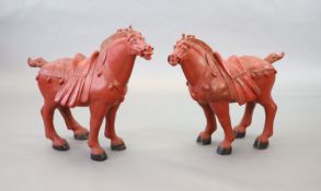 A pair of large Chinese lacquered composition models of horses with plinth stands89x96cm