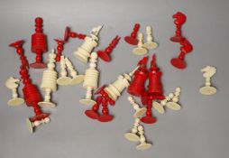 A 19th century natural and red stained bone chess set