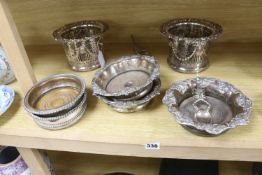 A pair of late Victorian pierced silver plated magnum coasters, height 12cm, two other pairs of