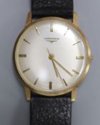 A gentleman's 1960's 9ct gold Longines manual wind wrist watch (lacking winding crown), with case
